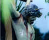 Face of Jesus on Chest of Statue